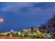 Commercial building and blue light tents with trees at 11178 Corsica Mist Ave, Las Vegas, NV 89135