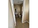 Traditional bathroom features a pedestal sink, toilet, tan walls and tile floor at 1155 Paradise Safari Dr, Henderson, NV 89002