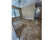 Bedroom with a ceiling fan, tiled floors, neutral color scheme, and a street view at 1155 Paradise Safari Dr, Henderson, NV 89002