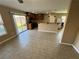 Open-concept kitchen and dining area with sliding glass doors to the backyard at 1155 Paradise Safari Dr, Henderson, NV 89002