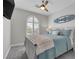 Charming bedroom with a surf-themed decor, plantation shutters, and carpet flooring at 11732 Del Sur Ave, Las Vegas, NV 89138