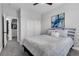 Well-lit bedroom with a neutral color scheme, closet, and plush carpeting for a cozy feel at 11732 Del Sur Ave, Las Vegas, NV 89138