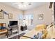 Cozy bedroom with natural light, desk, chair, and personal decor for a lived-in feel at 1204 Golf Club, Laughlin, NV 89029