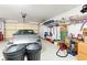 A garage scene featuring ample storage solutions and a sleek silver car at 1204 Golf Club, Laughlin, NV 89029