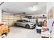 Organized garage space featuring ample storage and a silver car parked inside at 1204 Golf Club, Laughlin, NV 89029