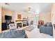 Bright living room with fireplace, neutral walls, plush seating, and elegant decor at 1204 Golf Club, Laughlin, NV 89029