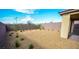 Low-maintenance backyard features desert landscaping and privacy wall at 12101 Arrebol Ave, Las Vegas, NV 89138
