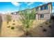 Low-maintenance backyard with desert landscaping and privacy fencing at 12101 Arrebol Ave, Las Vegas, NV 89138