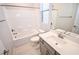 Neutral bathroom features shower-tub combo, modern vanity, and vanity mirror at 12101 Arrebol Ave, Las Vegas, NV 89138
