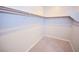 Walk in closet with shelving and carpeting at 12101 Arrebol Ave, Las Vegas, NV 89138