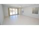 Bright and airy living room with sliding glass doors leading to the backyard at 12101 Arrebol Ave, Las Vegas, NV 89138