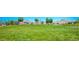 Fox Hill Park featuring a large grassy area with playground equipment and mature trees at 12101 Arrebol Ave, Las Vegas, NV 89138
