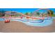 Bright and colorful playground area with unique climbing structures, perfect for Gathering fun at 12101 Arrebol Ave, Las Vegas, NV 89138