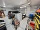 Spacious garage with ample storage, car, and overhead lighting at 1288 Ventura Cliffs Ave, Henderson, NV 89012