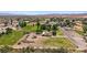 Aerial view showcasing the home, large lot, outbuilding, and surrounding landscape at 1470 St Joseph St, Overton, NV 89040