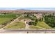 Spacious property featuring a home with a circular driveway and expansive green lawn at 1470 St Joseph St, Overton, NV 89040