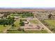 Aerial view of a property with home, outbuilding, and ample land at 1470 St Joseph St, Overton, NV 89040