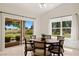 Bright dining area featuring access to the backyard and views of the surrounding landscape at 1470 St Joseph St, Overton, NV 89040