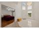 Bright entryway with tile flooring, high ceilings, chandelier, and open view into a bedroom at 1470 St Joseph St, Overton, NV 89040