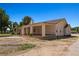Sprawling single story home with a wide covered porch and mature landscaping at 1470 St Joseph St, Overton, NV 89040