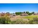 Exterior view of a charming home with an outbuilding, surrounded by lush greenery at 1470 St Joseph St, Overton, NV 89040