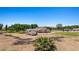 Exterior view of the home with outbuilding, on a large lot with mature trees at 1470 St Joseph St, Overton, NV 89040