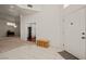 Welcoming foyer with tile floors and high ceilings leading to a spacious living area with hardwood floors at 1470 St Joseph St, Overton, NV 89040