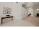 Bright open-concept foyer featuring tile flooring, high ceilings, and seamless flow into living spaces at 1470 St Joseph St, Overton, NV 89040