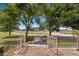 Inviting front porch featuring brick detail and iron railings, providing an open view at 1470 St Joseph St, Overton, NV 89040