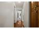 Hallway featuring hardwood floors and views into multiple rooms at 1470 St Joseph St, Overton, NV 89040
