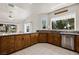 Large kitchen with granite countertops, tile floor, and wooden cabinets at 1470 St Joseph St, Overton, NV 89040