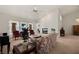 Comfortable living room featuring carpet, piano, fireplace, and large windows at 1470 St Joseph St, Overton, NV 89040