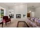 Neutral living room featuring a fireplace and open entryway at 1470 St Joseph St, Overton, NV 89040
