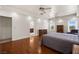 Large main bedroom boasts hardwood floors, tray ceiling, and natural light at 1470 St Joseph St, Overton, NV 89040