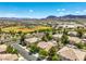 Scenic aerial view of a community featuring well-kept homes and green spaces at 1605 Colloquium Dr, Henderson, NV 89014