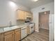 Bright kitchen featuring modern appliances and light wood cabinets at 1605 Colloquium Dr, Henderson, NV 89014