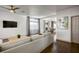 Bright living room with hardwood floors, modern decor, and comfortable seating at 1793 Clear River Falls Ln, Henderson, NV 89012