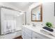 Clean bathroom featuring a shower over tub, and a bright vanity with ample storage space at 1808 Quartz Landing Ave, Las Vegas, NV 89183