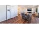 Bright dining area features modern furnishings and seamless access to the living area of the home at 1808 Quartz Landing Ave, Las Vegas, NV 89183