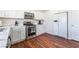 Clean kitchen featuring stainless steel appliances, white cabinets, and modern countertops at 1808 Quartz Landing Ave, Las Vegas, NV 89183