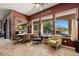 Bright dining area with large windows overlooking the backyard, perfect for Gathering meals and entertaining at 1981 Trophy Elk Ave, Logandale, NV 89021