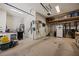 Ample garage storage with shelves, ladders, cleaning and automotive supplies at 1981 Trophy Elk Ave, Logandale, NV 89021