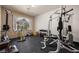 Home gym with rubber flooring, exercise equipment, and bright natural light at 1981 Trophy Elk Ave, Logandale, NV 89021