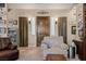 Inviting living room featuring a decorative front door, comfortable seating, and stylish decor at 1981 Trophy Elk Ave, Logandale, NV 89021
