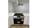 Stainless steel stove under a sleek stainless steel vent hood, set in white cabinets at 2080 Karen Ave # 60, Las Vegas, NV 89169