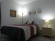 Well-appointed bedroom featuring a comfortable bed, tasteful decor, and a soothing ambiance for a restful night's sleep at 2615 W Gary Ave # 2013, Las Vegas, NV 89123