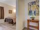 Bedroom access featuring artwork and a peek into the relaxing bedroom space at 2615 W Gary Ave # 2013, Las Vegas, NV 89123