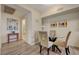Cozy dining area with glass table and three comfortable chairs, perfect for meals at 2615 W Gary Ave # 2013, Las Vegas, NV 89123