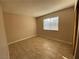Bedroom featuring tiled flooring and a window at 2685 Bryandouglas Dr, Las Vegas, NV 89121