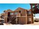 Multi-unit apartment building with black wrought iron staircase and neutral exterior paint at 2685 Bryandouglas Dr, Las Vegas, NV 89121